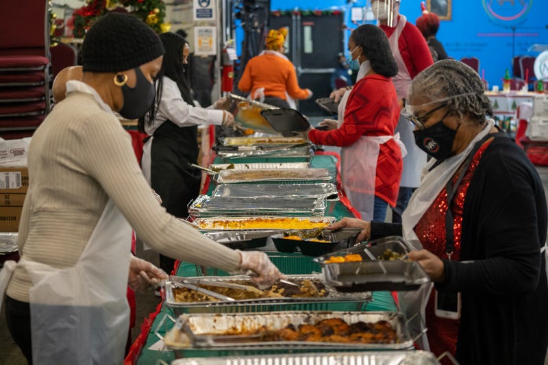 Members of the National Action Network prepare meals and celebrate Christmas by feeding the community at their annual event on December 25, 2020 in New York City. Due to COVID-19 restrictions, NAN's annual Christmas celebration became a two-day event with a toy distribution on Christmas Eve and a southern style holiday meal that's available to go on Christmas Day. 