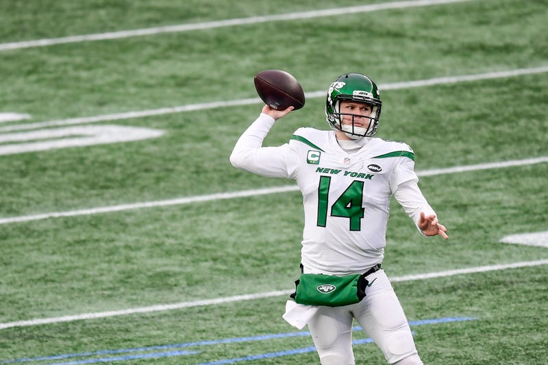 Former Jets QB Sam Darnold about to attempt a pass.
