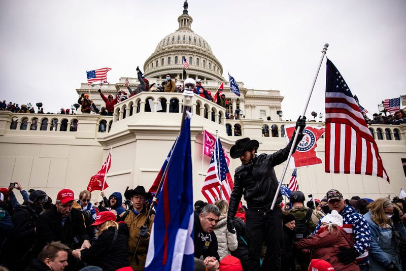 : Pro-Trump supporters storm the U.S. Capitol following a rally with President Donald Trump on January 6, 2021 in Washington, DC. T