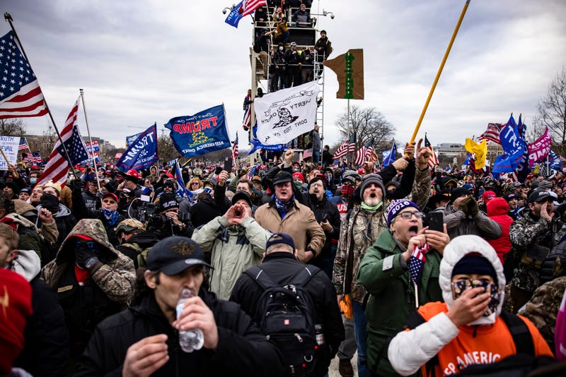 Pro-Trump supporters storm the U.S. Capitol following a rally with President Donald Trump on January 6, 2021 in Washington, DC. Trump supporters gathered in the nation's capital today to protest the ratification of President-elect Joe Biden's Electoral College victory over President Trump in the 2020 election.