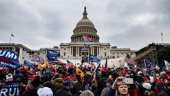 Mother and son charged with helping steal laptop from Nancy Pelosi's office