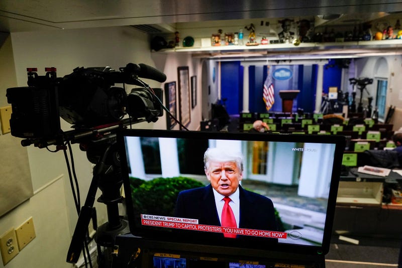 U.S. President Donald Trump is shown speaking on a monitor in the White House briefing room about the violence during the ratification of the 2020 election on January 6, 2021 in Washington, DC. Pro-Trump protesters have entered the U.S. Capitol building after mass demonstrations in the nation's capital. (Photo by Joshua Roberts/Getty Images)