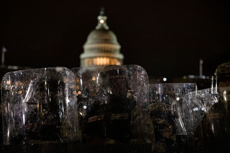 Members of the National Guard and the Washington D.C. police stand guard to keep demonstrators away from the U.S. Capitol on January 06, 2021 in Washington, DC. A pro-Trump mob stormed the Capitol earlier, breaking windows and clashing with police officers. Trump supporters gathered in the nation's capital to protest the ratification of President-elect Joe Biden's Electoral College victory over President Donald Trump in the 2020 election.