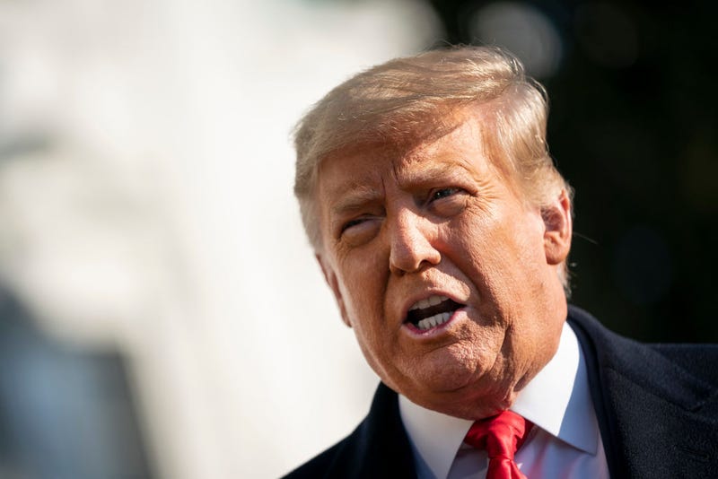 President Donald Trump speaks to reporters on the South Lawn of the White House before boarding Marine One on January 12, 2021 in Washington, DC.