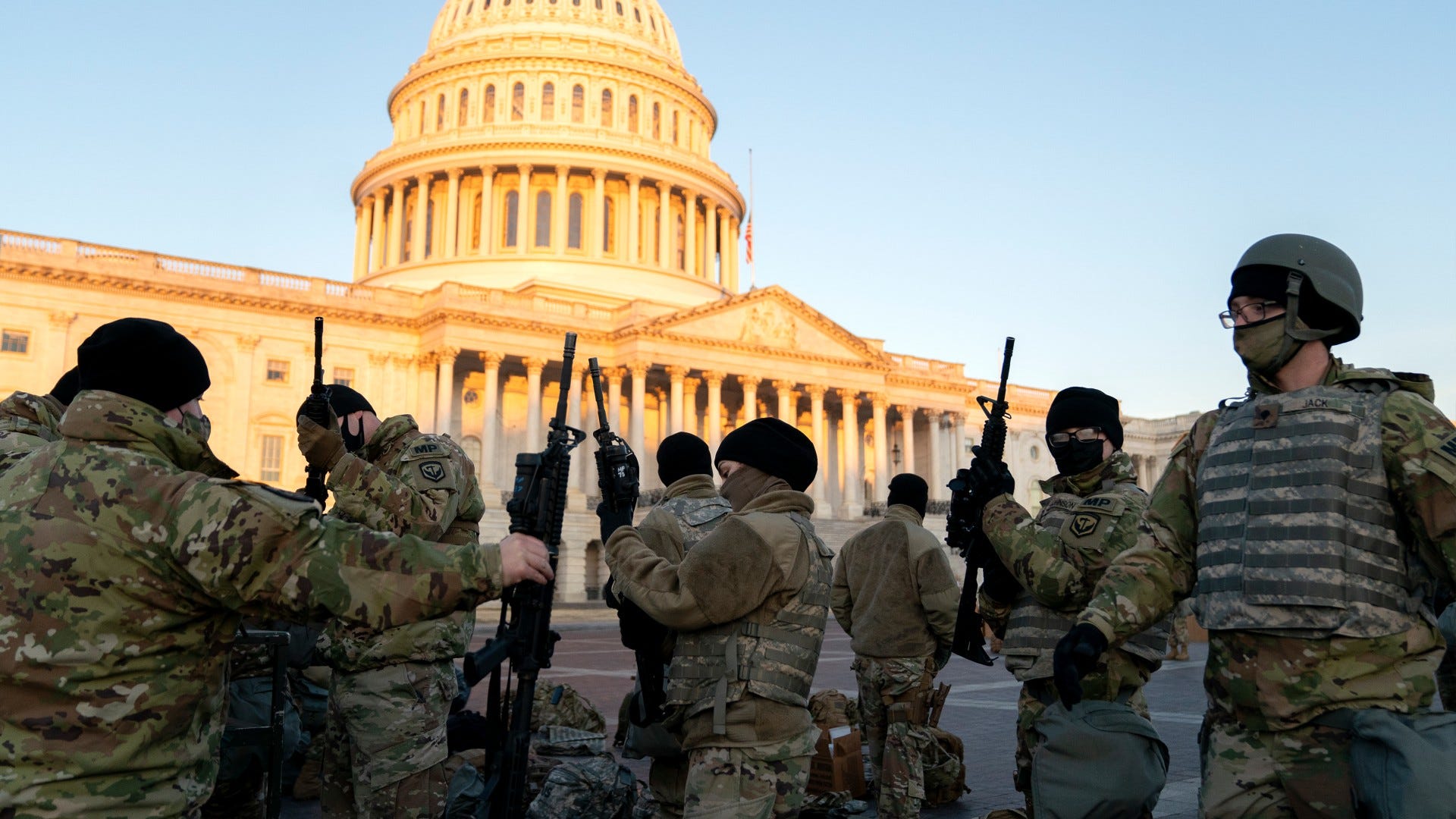 Expecting trouble, officials deploy 15,000 armed National Guardsmen to D.C.
