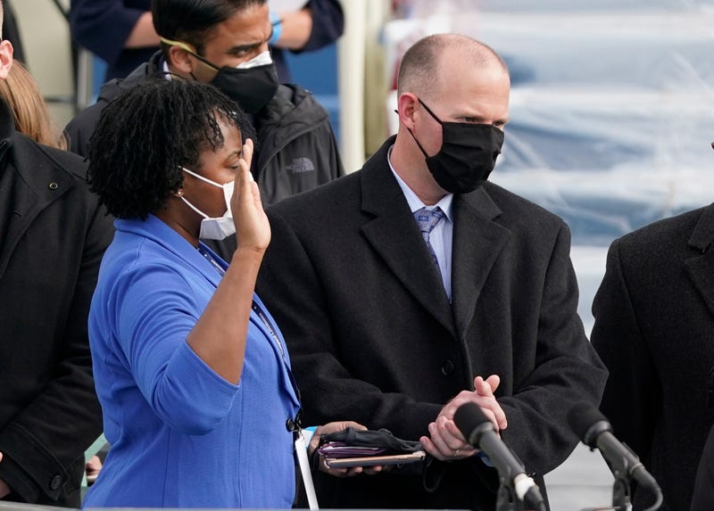 A stand-in for Vice President-elect Kamala Harris (L) practices being sworn-in as a stand-in for Doug Emhoff looks on during a rehearsal for the inaugural ceremony for President-elect Joe Biden and Vice President-elect Kamala Harris on January 18, 2021 in Washington, DC. Patrick Semansky-Pool/Getty Images