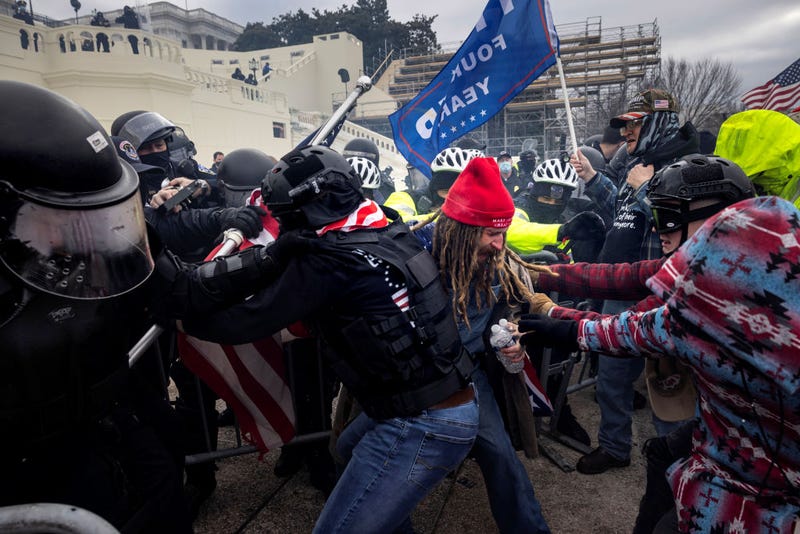 Trump supporters clash with police and security forces as people try to storm the US Capitol on January 6, 2021 in Washington, DC