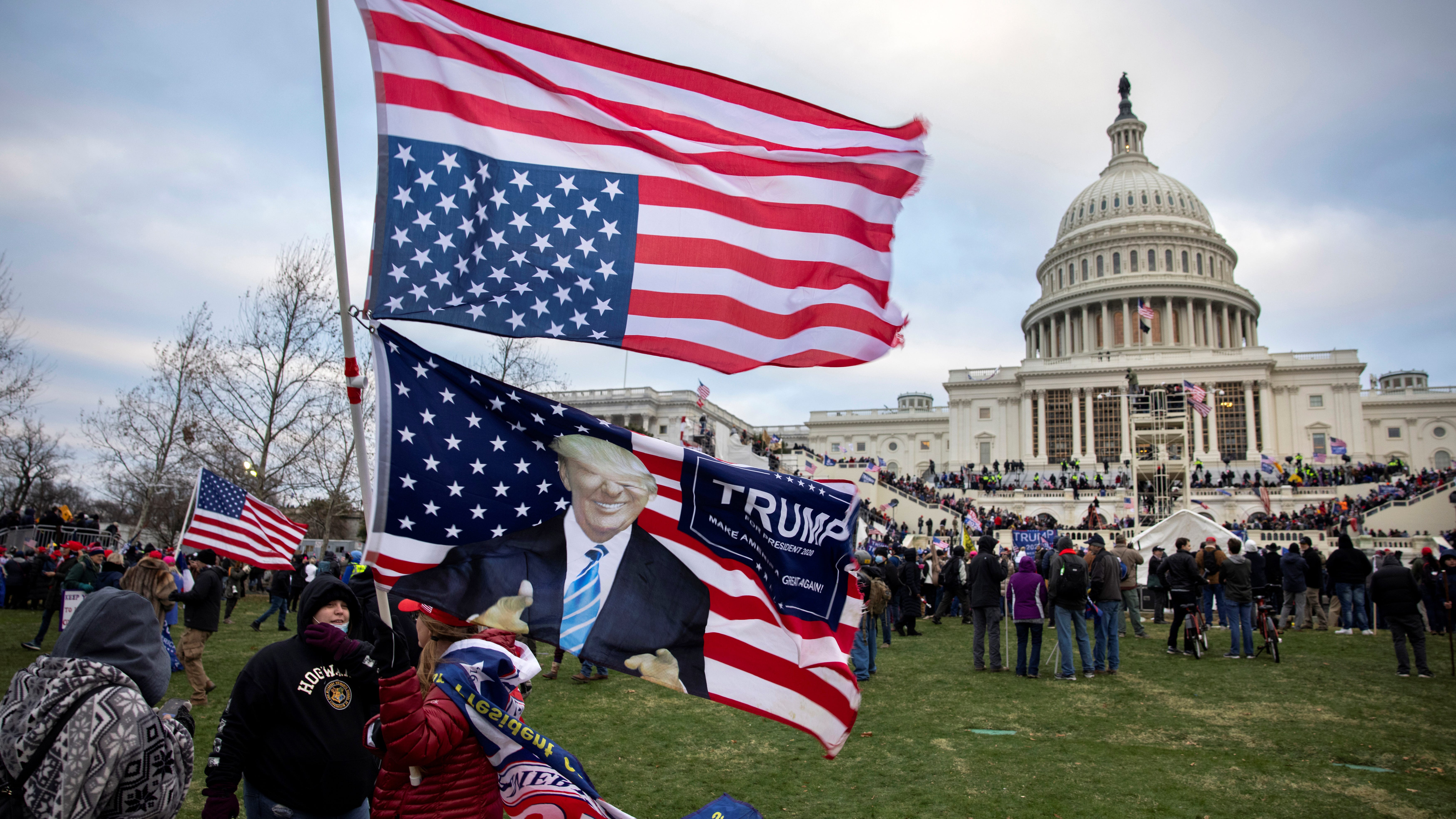 Chicagoan who wore ‘Trump 2020’ flag pleads guilty with father to role in U.S. Capitol attack