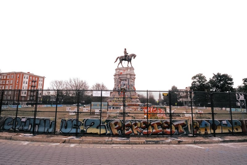 An 8-foot fence is erected around the Robert E. Lee monument on January 25, 2021 in Richmond, Virginia. The State Department of General Services in Richmond installed the fence to ensure the safety of visitors and workers as they prepare the site for the removal of the statue.