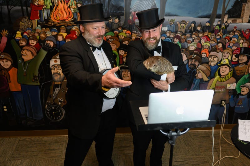 Punxsutawney Groundhog Club Inner Circle Members Jason Gursky and official handler, AJ Dereume and Punxsutawney Phil