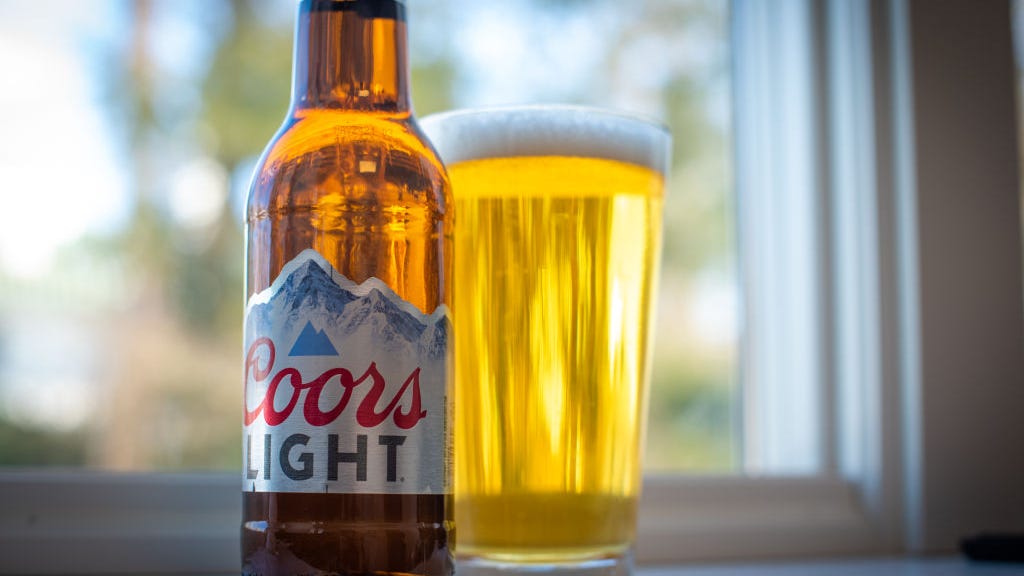 Woman known for viral 'I Need More Beer' sign dies at 94