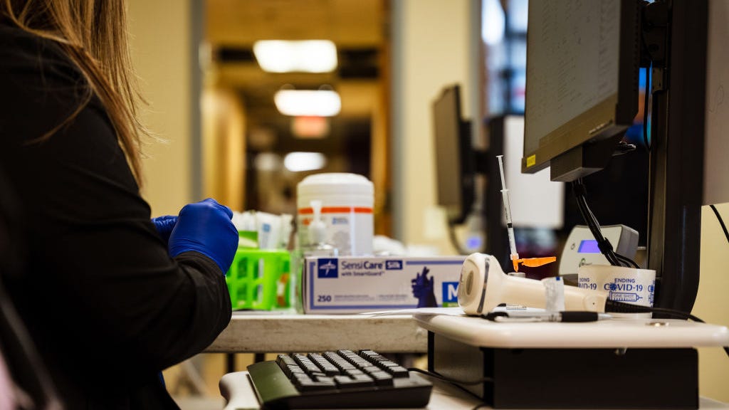 Arbitration panel halts deadline requiring city workers to be vaccinated