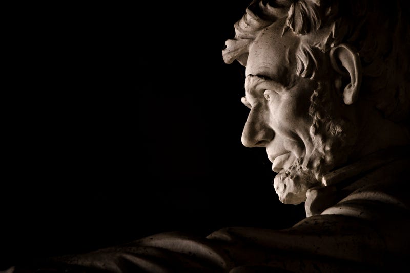 A newly unveiled statue of America's 16th president in a Kalamazoo park was the target of vandalism this week after someone spray painted it with red graffiti.