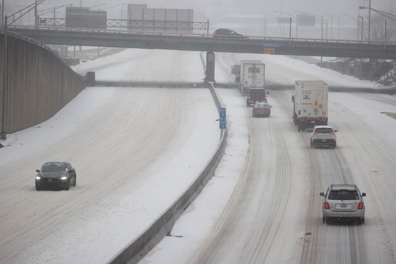 Traffic braves the ice and snow from 2021 winter storm Uri