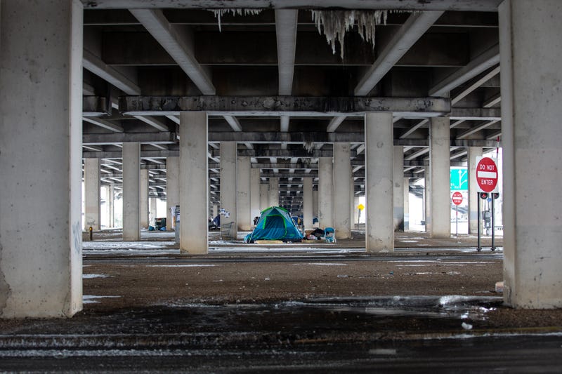homeless beneath bridge 