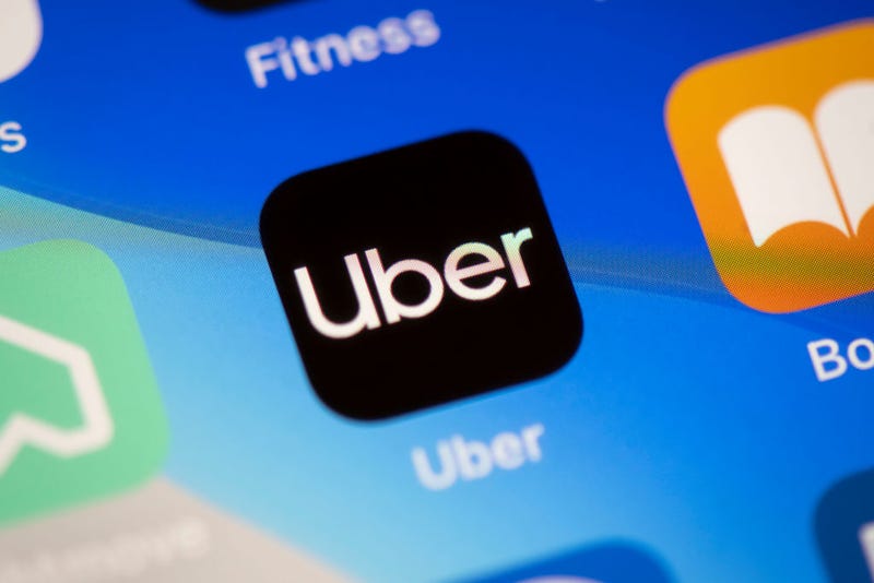 File photo of the Uber app icon on a phone screen.