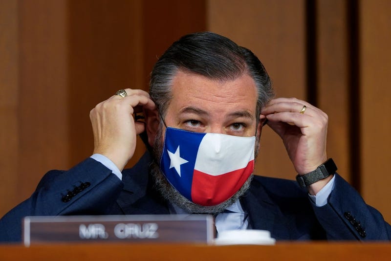 . Ted Cruz (R-TX) adjusts his face covering as Attorney General nominee Merrick Garland testifies during his confirmation hearing before the Senate Judiciary Committee in the Hart Senate Office Building on February 22, 2021 in Washington, DC. Garland previously served at the Chief Judge for the U.S. Court of Appeals for the District of Columbia Circuit.