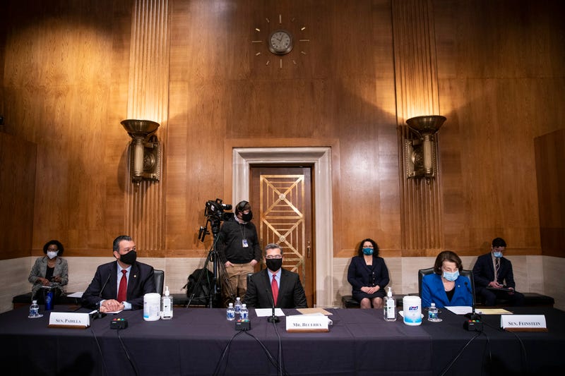 Senator Alex Padilla (D-CA), Xavier Becerra, Secretary of Health and Human Services (HHS) nominee, and Senator Dianne Feinstein (D-CA) attend Becerra's confirmation hearing before the Senate Health, Education, Labor and Pensions Committee on February 23, 2021 in Washington, DC. 