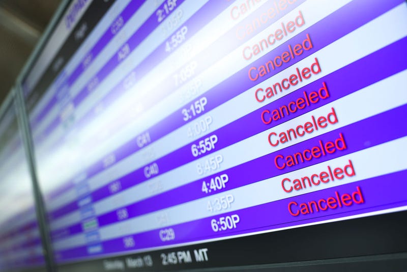 flight status board with cancelations
