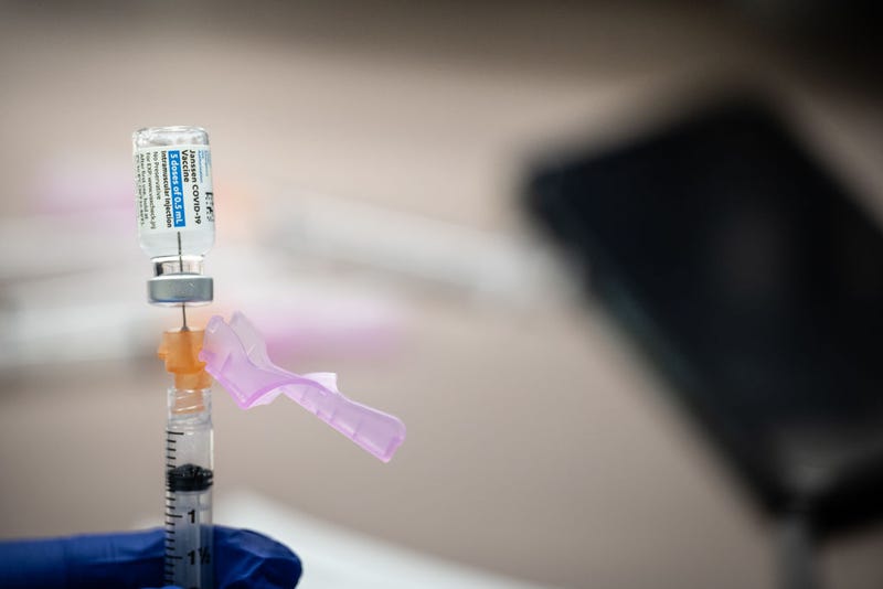 A syringe with a dose of the Johnson & Johnson COVID-19 vaccine is filled at Wayside Christian Mission on March 15, 2021 in Louisville, Kentucky. Norton Healthcare, in coordination with Metro Louisville and Louisville Public Health and Wellness, held a COVID vaccination event at Wayside Christian Mission for the many people without homes served at that location. (Photo by Jon Cherry/Getty Images)