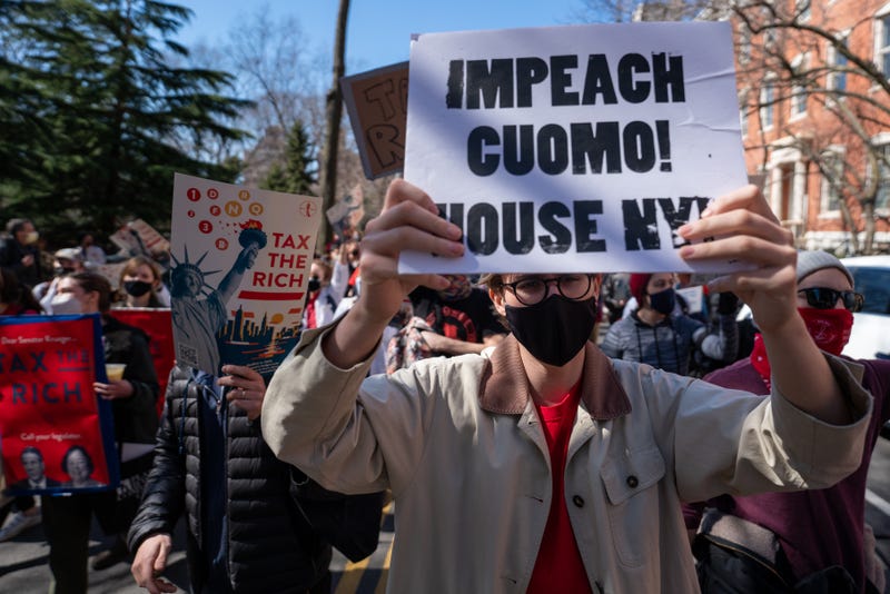 Protesters gather at Washington Square Park to demand the resignation of New York Governor Andrew Cuomo on March 20, 2021 in New York City