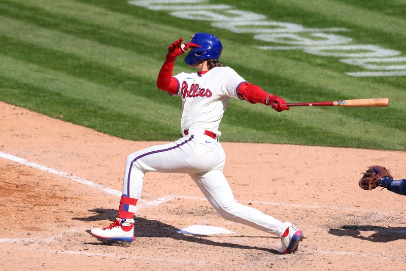 Phillies third baseman Alec Bohm hits a single to score the go ahead run against the Atlanta Braves in the eighth inning of a baseball game at Citizens Bank Park on April 4, 2021. The Phillies defeated the Braves 2-1.