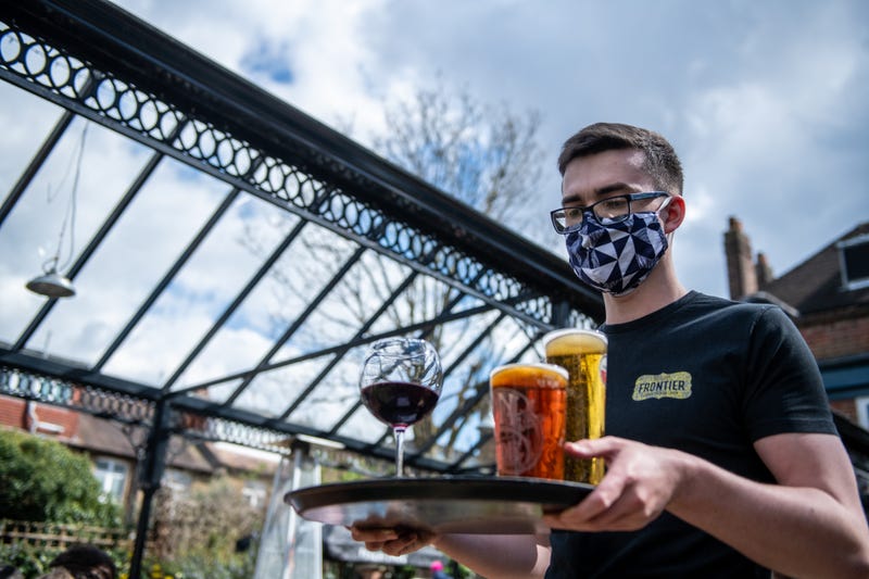 Server holding drinks