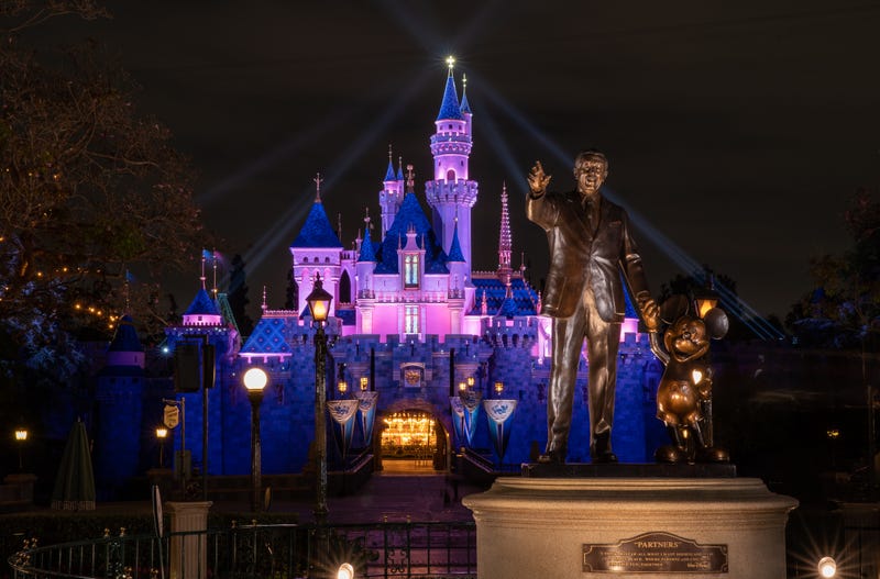 APRIL 26: In this handout photo provided by Disneyland Resort, a view of Sleeping Beauty Castle in Disneyland Park illuminated during a special live streamed moment to welcome Cast Members back to the resort on April 26, 2021 at Disneyland Resort in Anaheim, California. 