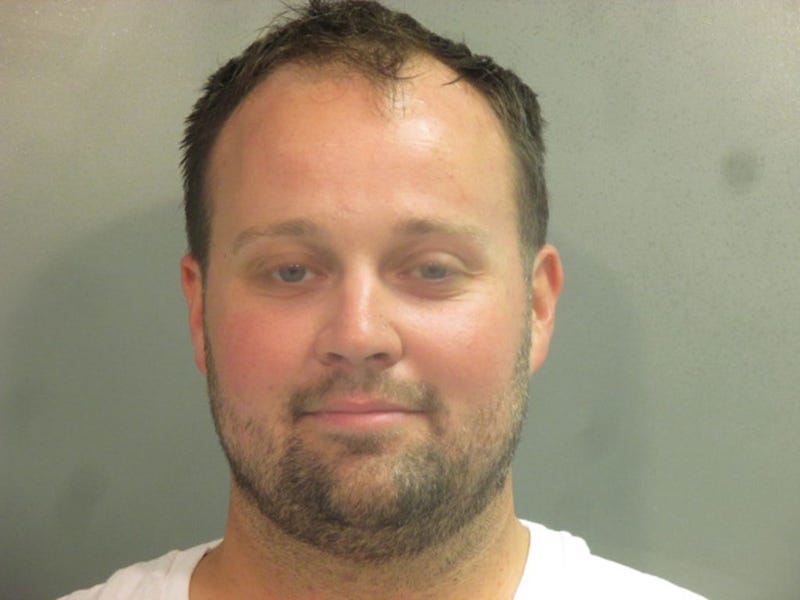  In this handout photo provided by the Washington County Sheriff’s Office, former television personality on "19 Kids And Counting" Josh Duggar poses for a booking photo after his arrest April 29, 2021 in Fayetteville, Arkansas. Duggar was reportedly arrested by federal agents and is being detained on a federal hold. (Photo by Washington County Sheriff’s Office via Getty Images)