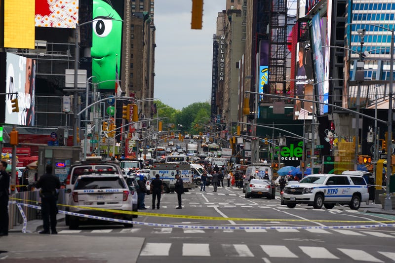 Police officers are seen in Times Square on May 8, 2021 in New York City. According to reports, three people, including a toddler, were injured in a shooting near West 44th St. and 7th Ave.