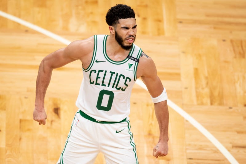 Celtics star Jayson Tatum pumped up on the court.