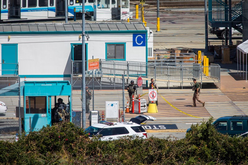 Law enforcement gather at the Valley Transportation Authority (VTA) light-rail yard where a mass shooting occurred on May 26, 2021 in San Jose, California