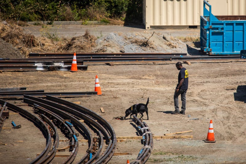 An ATF officer patrols the VTA light rail yard on Wednesday.