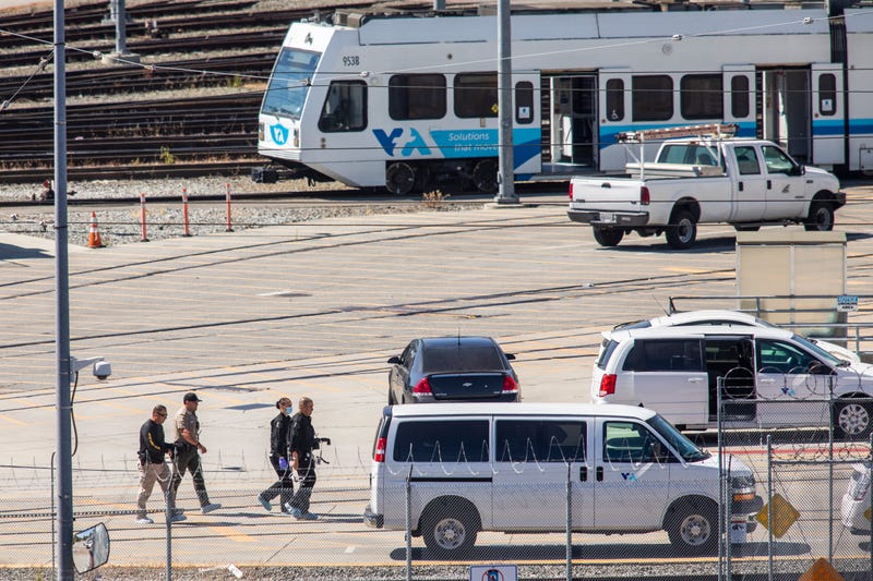 Investigators work the scene near the site where a mass shooting at the Valley Transportation Authority (VTA) light-rail yard on May 26, 2021 in San Jose, California.