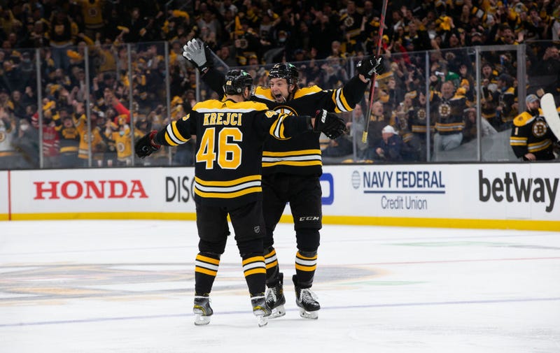 Charlie McAvoy celebrates his goal with David Krejci
