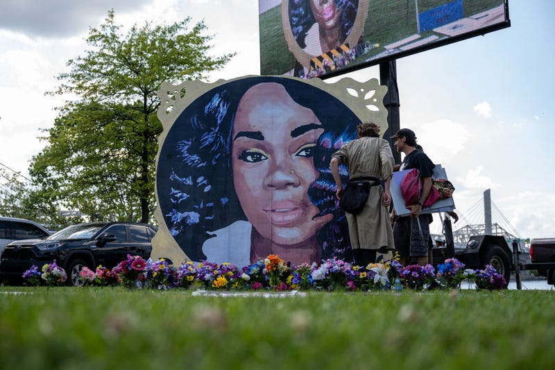 Protesters and volunteers prepare a Breonna Taylor art installation in Louisville, Kentucky.