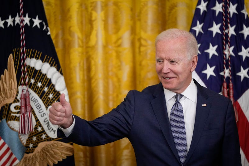 U.S. President Joe Biden gives the thumbs up to the audience before signing the Juneteenth National Independence Day Act into law in the East Room of the White House on June 17, 2021 in Washington, DC.