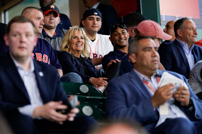 First lady Jill Biden and Second Gentleman Doug Emhoff sit with military members and first responders as they attend a baseball game between the Houston Astros and the Baltimore Orioles at Minute Maid Park, in Houston, Texas, on June 29, 2021. 