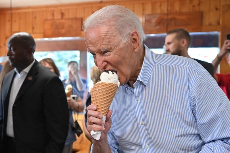 US President Joe Biden eats ice cream at Moomers Homemade Ice Cream in Traverse City, Michigan on July 3, 2021. 