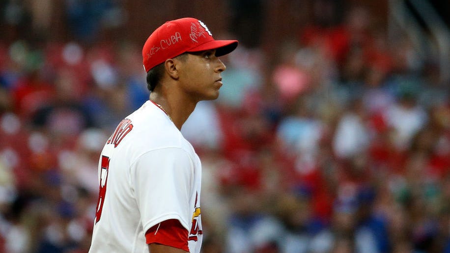 Cardinals pitcher writes 'SOS CUBA' on hat to show support for protesters