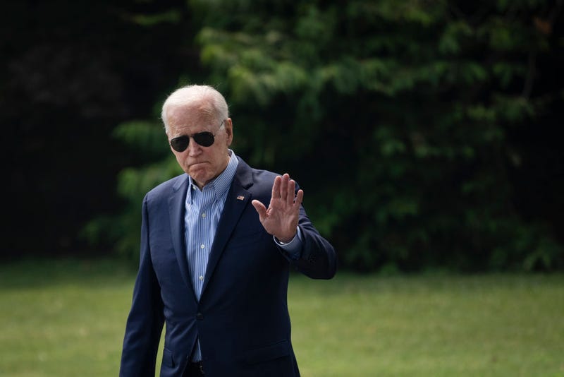 U.S. President Joe Biden waves as he walks to Marine One on the South Lawn of the White House on July 21, 2021. He was headed to Cincinnati, OH. 