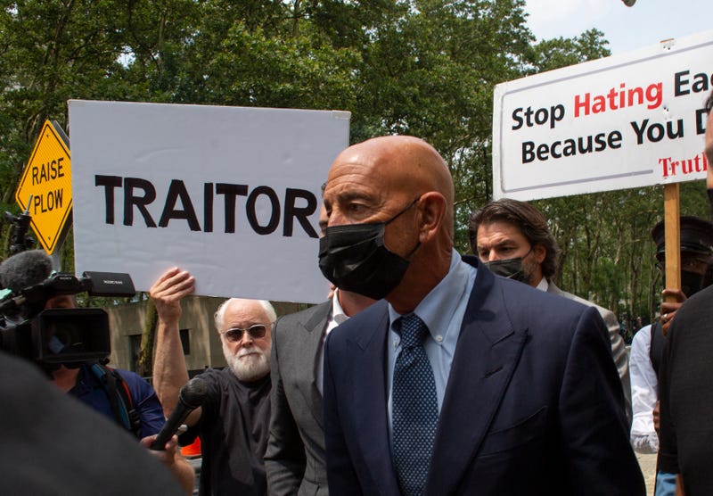 Thomas Barrack (R), a close adviser to former President Donald Trump and chair of his inaugural committee, leaves after attending a hearing at the US District Court of Eastern District of New York on July 26, 2021 in New York City. - Thomas Barrack, a close ally to former US president Donald Trump and one of his top fundraisers, was arrested and charged on July 20, 2021 with not disclosing his lobbying on behalf of a foreign government. Barrack, a private equity investor and longtime Trump friend who chaired Trump's 2017 inaugural committee, had also been charged with obstruction of justice and making multiple false statements to the Federal Bureau of Investigation about his work for the UAE. 