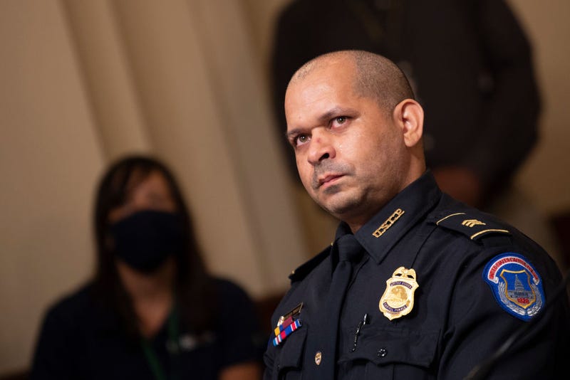 Aquilino Gonell, sergeant of the U.S. Capitol Police, watches a video of rioters during a hearing of the House select committee investigating the January 6 attack on the U.S. Capitol on July 27, 2021 at the Canon House Office Building in Washington, DC.