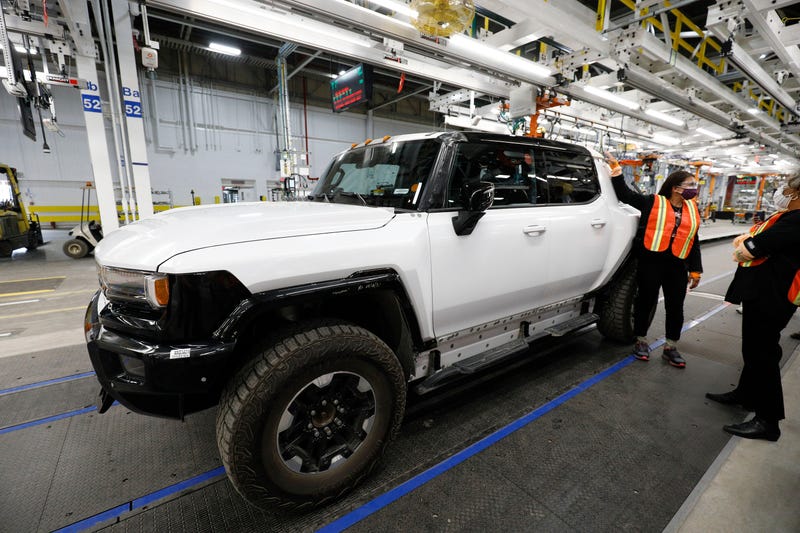 DETROIT, MI - AUGUST 05: U.S. representative Rashida Tlaib looks at a GM Hummer EV Truck while touring General Motors Factory Zero with U.S. Secretary of Energy Jennifer Granholm on August 5, 2021 in Detroit, Michigan. Secretary Granholm is touring several manufacturing facilities in southeast Michigan today to help promote the Biden administrations infrastructure proposal.