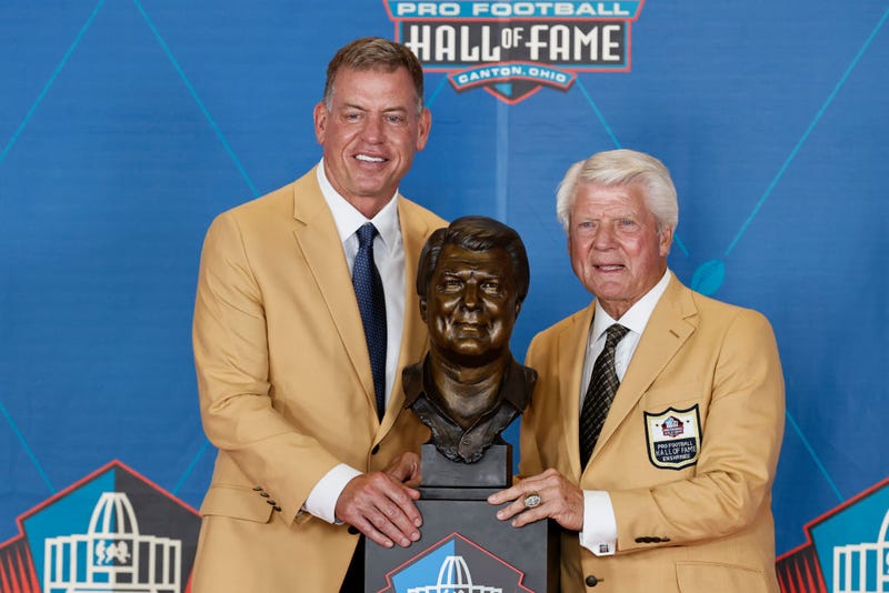 immy Johnson, a member of the Pro Football Hall of Fame Centennial Class, right, poses with his presenter Troy Aikman during the induction ceremony at the Pro Football Hall of Fame on August 7, 2021