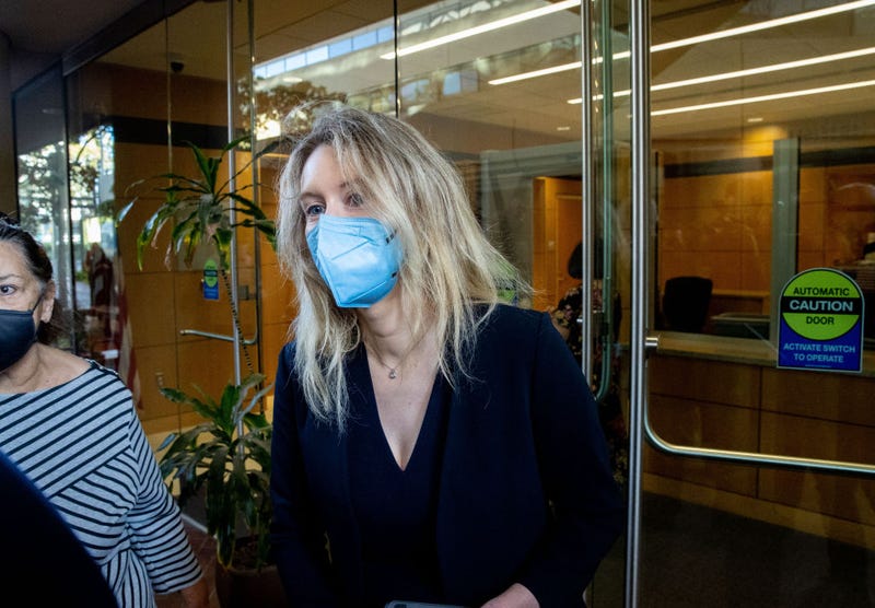 Theranos founder Elizabeth Holmes arrives at the Robert F. Peckham Federal Building with her defense team on August 31, 2021 in San Jose, California.