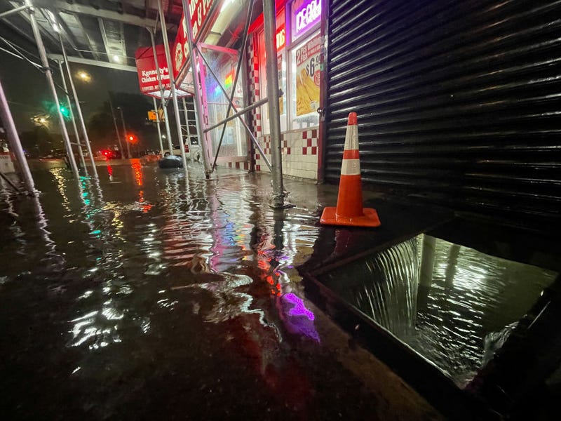 Rainfall from Hurricane Ida flood the basement of a Kennedy Fried Chicken fast food restaurant on September 1, 2021, in the Bronx borough of New York City.