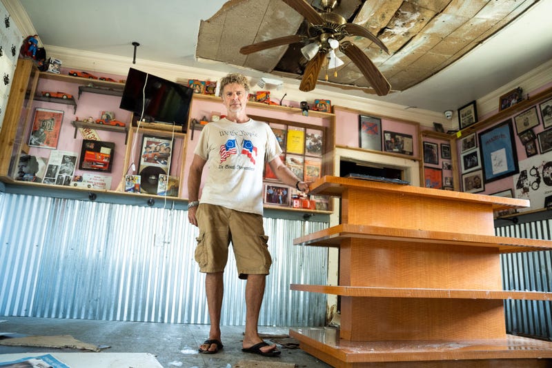 Actor John Schneider, known for his role as Bo Duke in "The Dukes of Hazzard" television series, stands inside his studio that was damaged by Hurricane Ida on September 2, 2021 in Holden, Louisiana. Ida made landfall as a Category 4 hurricane Sunday in Louisiana, bringing flooding, wind damage and power outages along the Gulf Coast. (Photo by Sean Rayford/Getty Images)