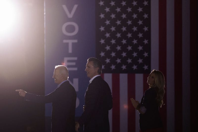 U.S. President Joe Biden, California Gov. Gavin Newsom and Jennifer Lynn Siebel Newsom wave to the crowd as they campaign to keep the governor in office at Long Beach City College on the eve of the last day of the special election to recall the governor on September 13, 2021 in Long Beach, California.