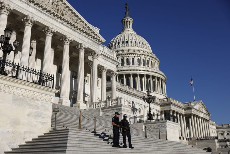 U.S. Capitol Police officers stand guard on the House steps at the U.S. Capitol in Washington, D.C., U.S., on Friday, Oct. 1, 2021.